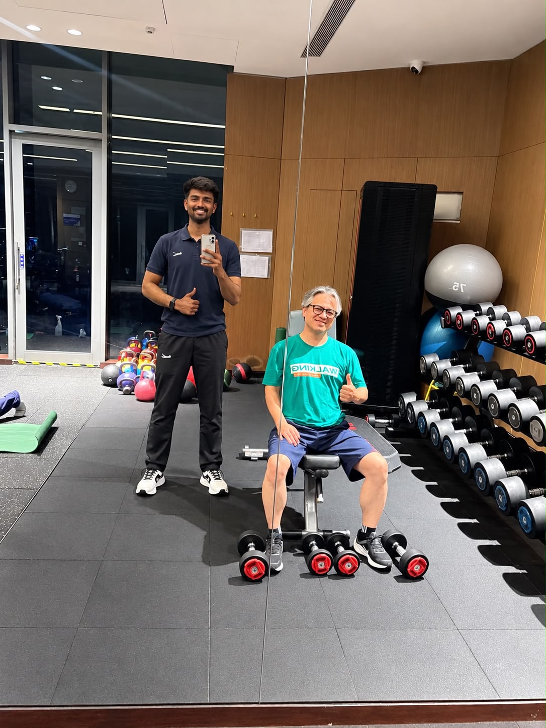 Dr. Yashwanth with a patient after a strengthening session